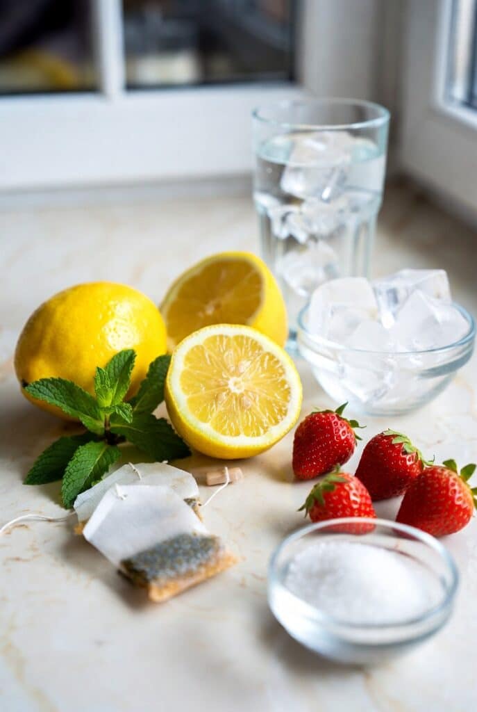 Easy Summer Lemonades and Iced Teas Everyone Craves 7 Fresh ingredients for easy summer lemonades and iced teas including lemons, mint, strawberries, and tea