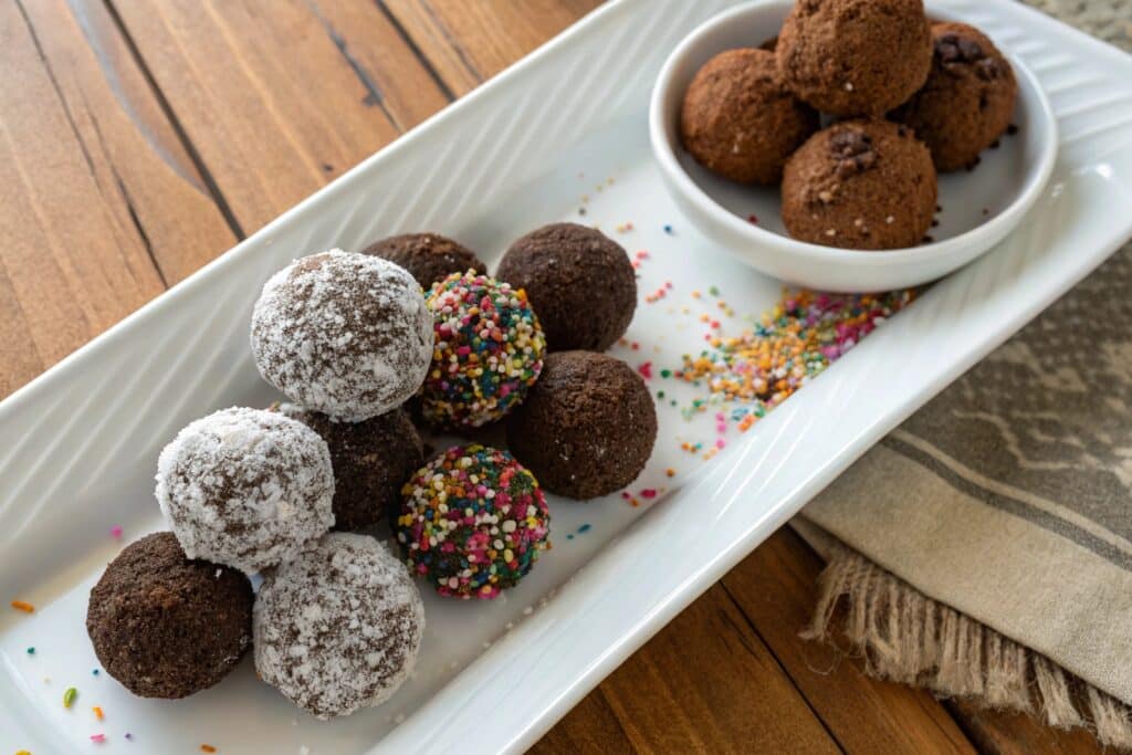 assorted no-bake brownie balls on plate