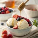 Bowl of creamy cottage cheese ice cream with toppings