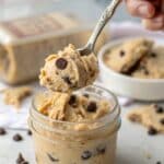 Spoonful of edible protein cookie dough with chocolate chips