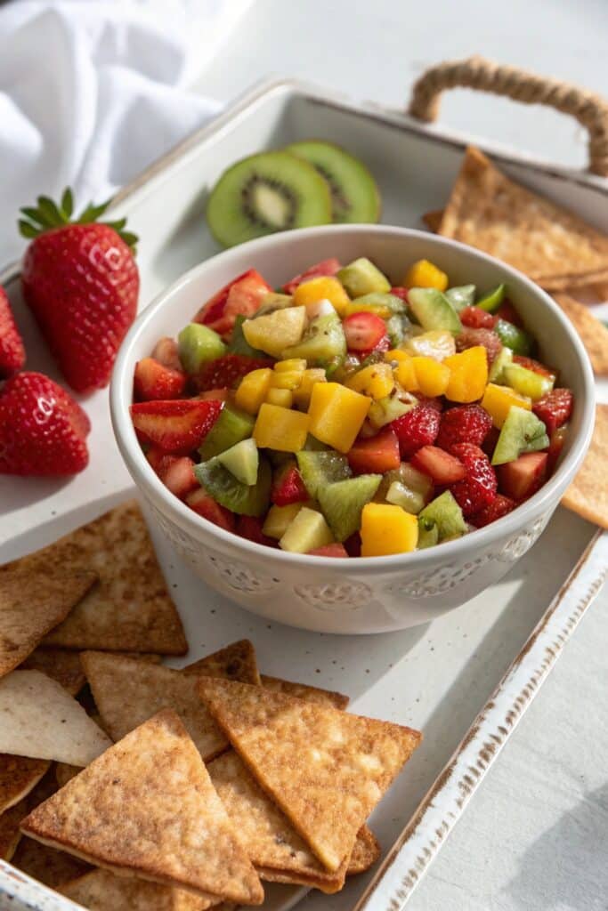 Served fruit salsa and cinnamon chips