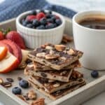 Healthy cookie dough bark broken on parchment
