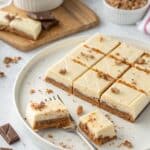 Serving no-bake Kinder cheesecake bar
