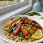 Rainbow veggie quinoa bowl with green tahini
