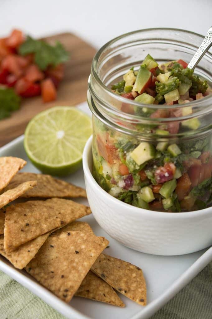 Taco mason jar lunch served in a bowl with tortilla strips