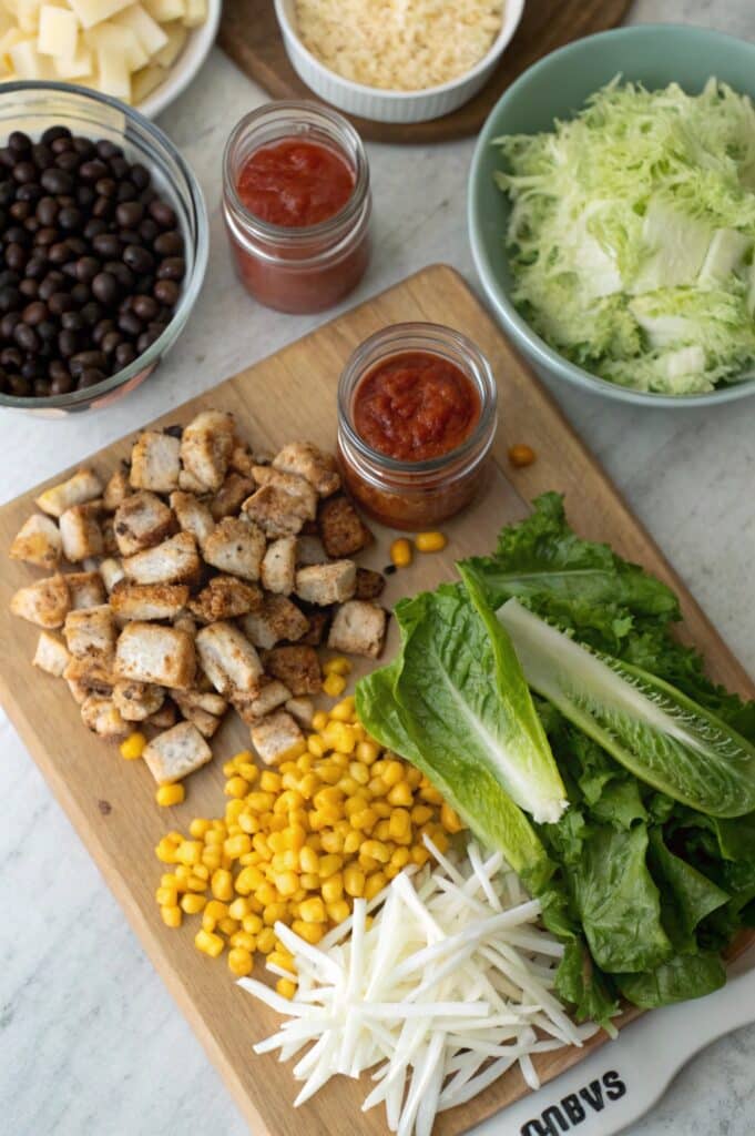 Ingredients for taco mason jar lunch on table